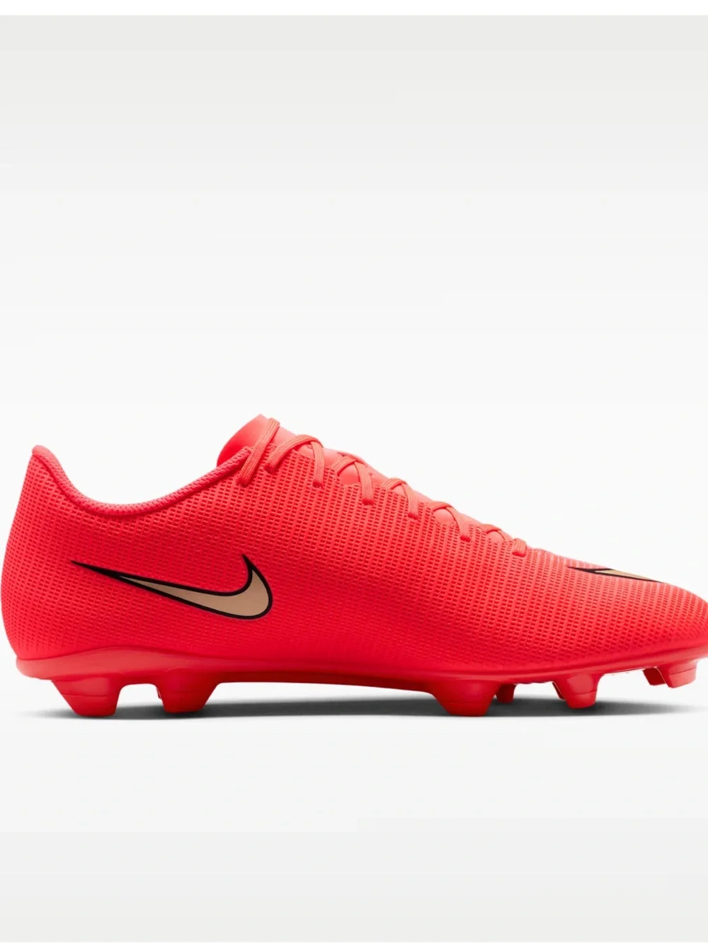 Nike Women’s Red Soccer Cleats with Gold Swoosh Accent